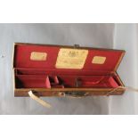 Cogswell and Harrison a leather gun case,
