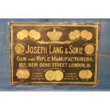 Joseph Lang & Son Ltd London a leather shotgun motor case opening to a blue baize lined interior