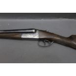 An AYA 12 bore side by side shotgun, with 26" barrels, quarter and half choke, 70 mm chambers,