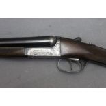 A Webley & Scott model 700, 12 bore side by side shotgun, with 25" barrels, half and full choke,