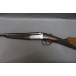 Belgian 410 double barrelled shotgun, with 27 1/2" barrels, quarter and quarter choke,