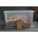 A large plastic box filled with cork fly rod handles, internal diameter 10 mm, length 20.5 cm.