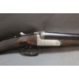 Thomas Wild a 12 bore side by side shotgun, with 30" barrels, cylinder and half choke,