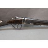 AYA a 12 bore side by side shotgun, with 26" barrels, quarter and half choke,