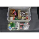 A large plastic box filled with hooks, glow beads, Octopus bait sea fishing jigs, plastic bags etc.