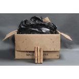 A large plastic box filled with cork fly rod handles, various sizes and lengths,