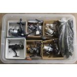 Six fixed spool reels and twenty reel storage cases, the reels including Mitchell Avocet 6000,