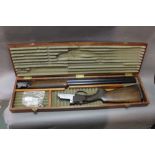 Lincoln a 12 bore over under shotgun with 30" barrels, three quarter and half choke,