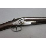 Tipping & Lawden London a 13 bore semi hammerless shotgun, with 30" Damascus barrels,