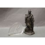 A bronze resin figure of a fisherman with pike, height +/- 22 cm,
