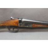 AYA a 12 bore side by side shotgun, with 28" chopper lump barrels, quarter and three quarter choke,