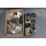 A box of reel spare parts, frames, spools etc, to include Okuma, Shakespeare, BFR, Shimano,