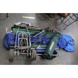 A Shakespeare SKP rod holdall, together with various three piece coarse fishing rods, trolley, seat,