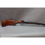 Baikal a 12 bore side by side shotgun with 26" barrels, quarter choke, 2 3/4" chambers, boxlock,