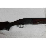 A Russian 12 bore over/under shotgun with 27 3/4 " barrels, half and quarter choke, 70 mm chambers,