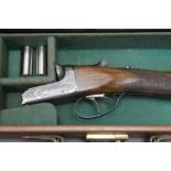 William Powell & Son a 12 bore side by side shotgun with 29" barrels, quarter and half choke,