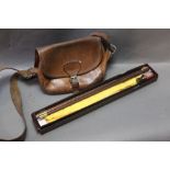 A Gunmark leather cartridge bag, together with a 410 shotgun cleaning kit.