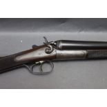 William Ford a 12 bore side by side hammer shotgun, with 28" steel barrels,