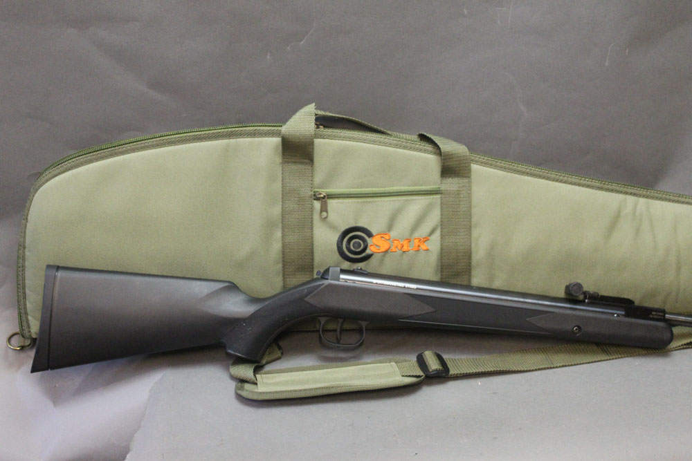 SMK Synsg cal 22 break barrel air rifle, with a synthetic stock, sold with an SMK gun slip,