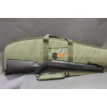 SMK Synsg cal 22 break barrel air rifle, with a synthetic stock, sold with an SMK gun slip,