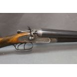 Armstrong & Co Newcastle on Tyne, a 12 bore side by side hammer shotgun,