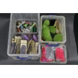 Three plastic boxes filled with dyed fox tails, Lure Flash tinsels, various threads, feathers etc.