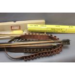 A selection of 12 bore and 410 cleaning rods, two cartridge belts etc.