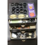 A collection of air gun spares, scope mounts, Eley cloth badges etc.