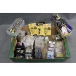 A box of sea fishing equipment to include hooks, swivels, various feather rigs etc.
