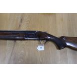 Miroku 12 bore over under shotgun, with 26" barrels, quarter and quarter choke, 2 3/4" chambers,