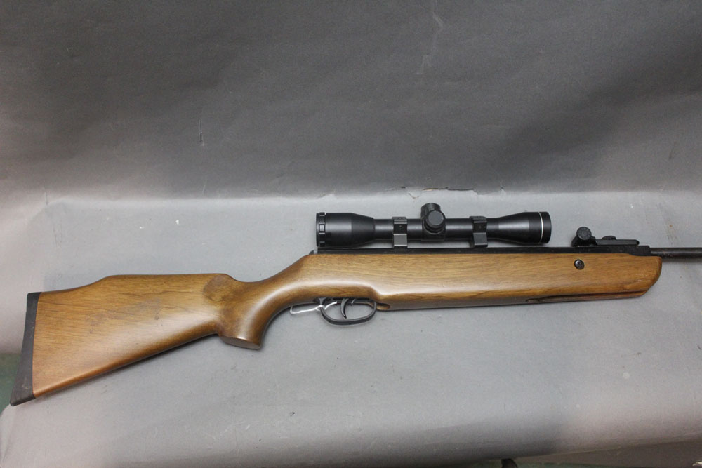 SMK Model 19 Cal 22 break barrel air rifle, with SMK 4 x 32 telescopic sight. Serial No. 0600597.