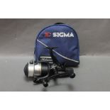 A Shimano ST6000 RA bait runner reel, with Shakespeare Sigma reel pouch.
