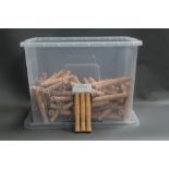 A large plastic box filled with cork fly rod handles, internal diameter 11 mm, length 18.5 cm.