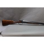 Baikal a 12 bore side by side shotgun with 27 1/2" barrels, half and three quarter choke,