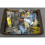 A Box of course fishing equipment to include Boilie rigs, Boilie needles, various spoons, plugs etc.