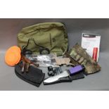An Armasight bag, a fixed blade divers knife, shotgun and rifle ammunition holders,