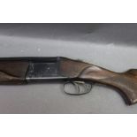 Baikal a 12 bore over under shotgun, with 28 1/2" barrels, 70 mm chambers, ejector, top lever,