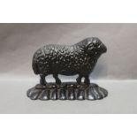 A cast iron door stop in the form of a sheep. Height 17 cm.