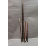 A bundle of ramrods, cleaning rods etc.