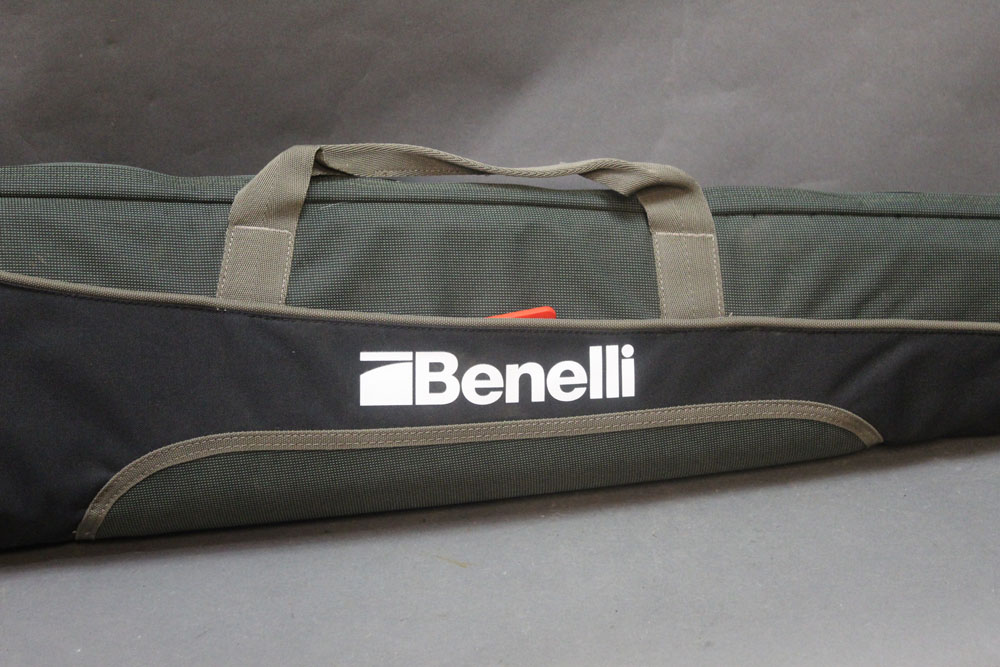 A Benelli shotgun slip, length 141 cm.