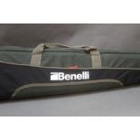 A Benelli shotgun slip, length 141 cm.