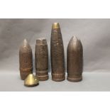 Five military projectiles from 6 - 31 cm in height.