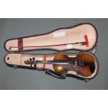 A late 19th century Czechoslovakian half size "Antonius Stradivarius" pattern violin with figured