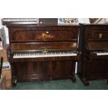 An Edwardian grained walnut John Spencer & Co upright piano retailed by Murdoch,