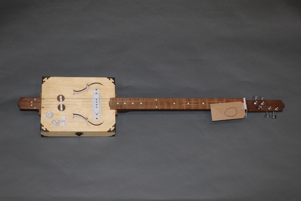 A hand built cigar box electric guitar, 95 cm long with stand for same. - Image 2 of 2