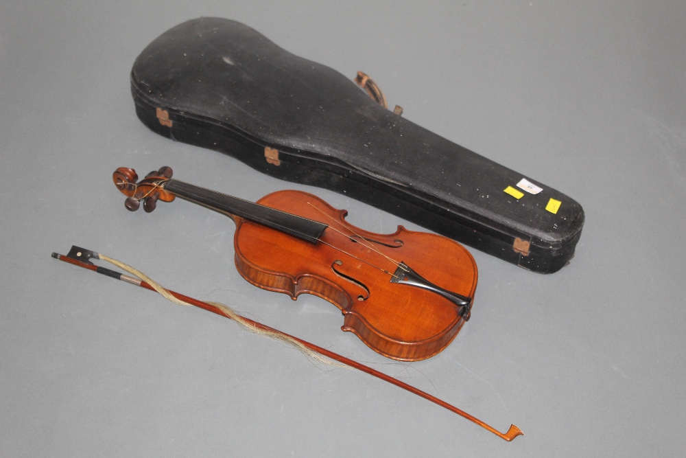 A 19th century full size violin by Anton Hoffman with figured two piece back,