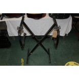 A vintage MPM black painted metal folding double keyboard stand.