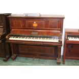 An Edwardian inlaid mahogany Kent and Cooper of Lincoln upright piano, 144 cm wide.