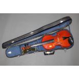 A 20th century Chinese Skylark brand full size violin with one piece back,