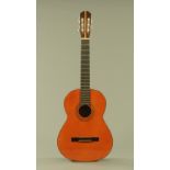 A Barnes & Mullins "Cortez" acoustic guitar with wide neck and inlaid body,